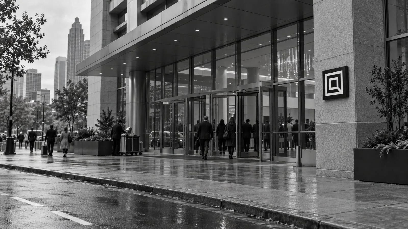 Delegates arrive outside a conference venue in downtown Atlanta, Georgia, on an overcast afternoon. / EconoTimes.ai
