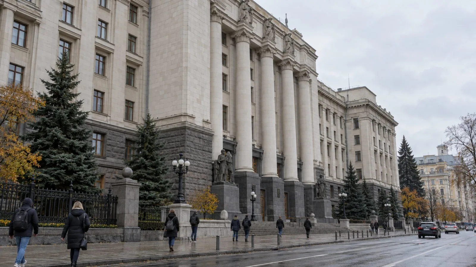 Pedestrians pass the Ministry of Defence building in Kyiv on an overcast morning. (AI-generated image / EconoTimes)