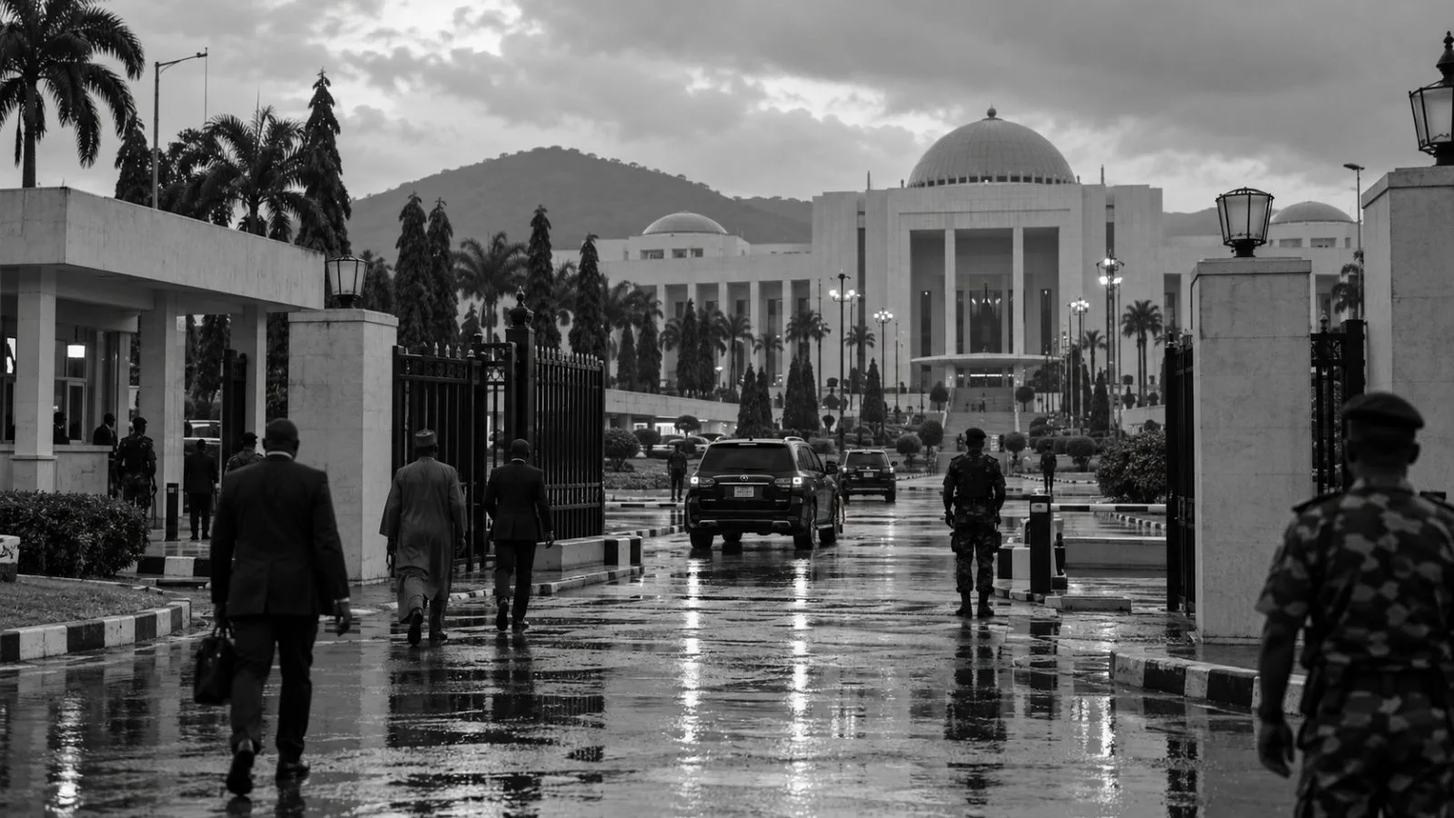 Security personnel stand beside the guarded entrance to Nigeria’s Presidential Villa in Abuja (AI-generated image / EconoTimes)