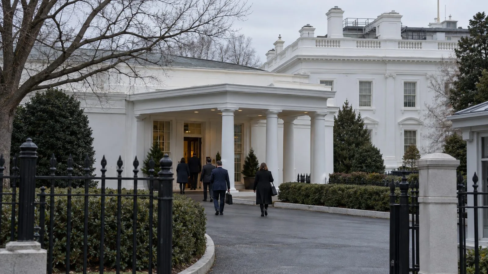 Staff enter the White House West Wing on an overcast morning in Washington. (AI-generated image / EconoTimes)