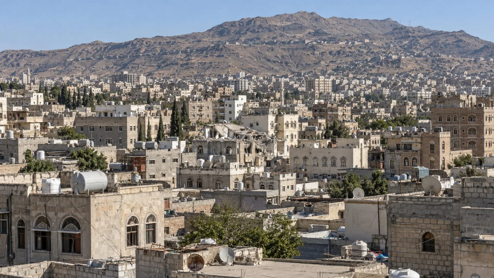 Residential buildings fill the Asr district of Sana’a, Yemen, on a clear afternoon. (AI-generated image / EconoTimes)