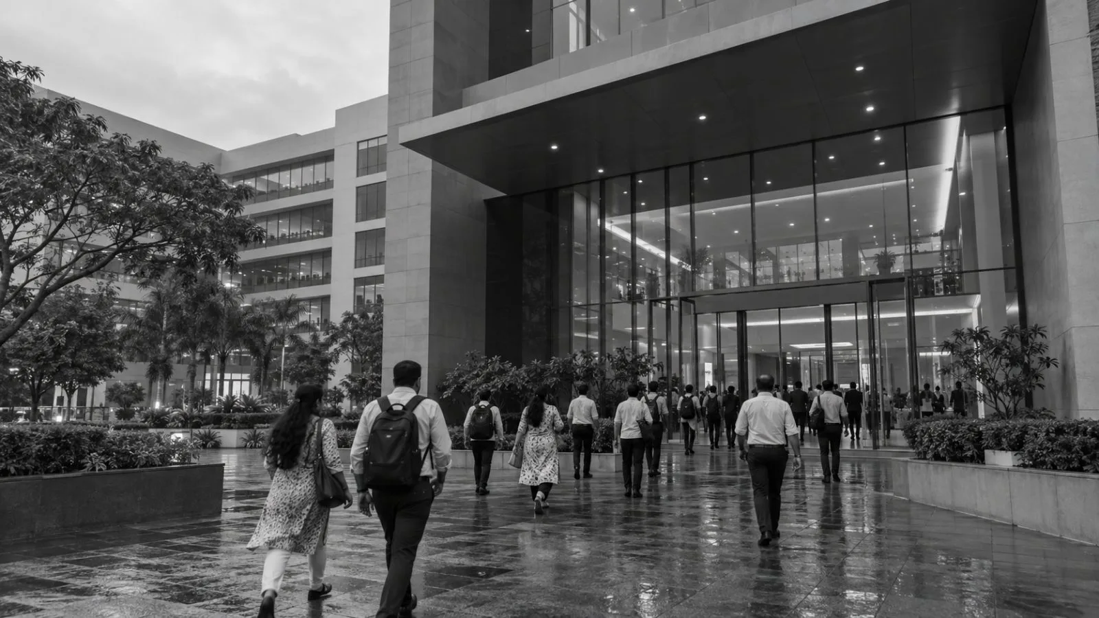 Employees enter West Block II at L&T Knowledge City in Vadodara, India. (AI-generated image / EconoTimes)
