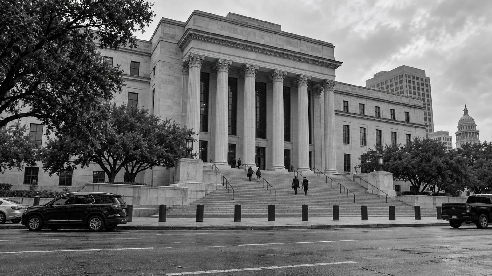 Visitors climb the steps of a federal courthouse in Austin, Texas, on an overcast morning. (AI-generated image / EconoTimes)