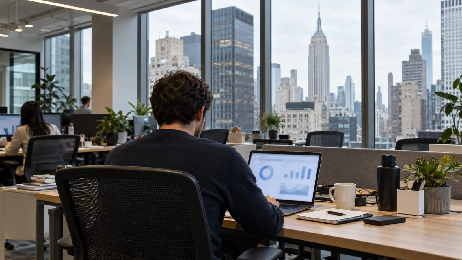 Office workers enter a commercial building in Midtown Manhattan, New York, on an overcast morning. (AI-generated image / EconoTimes)