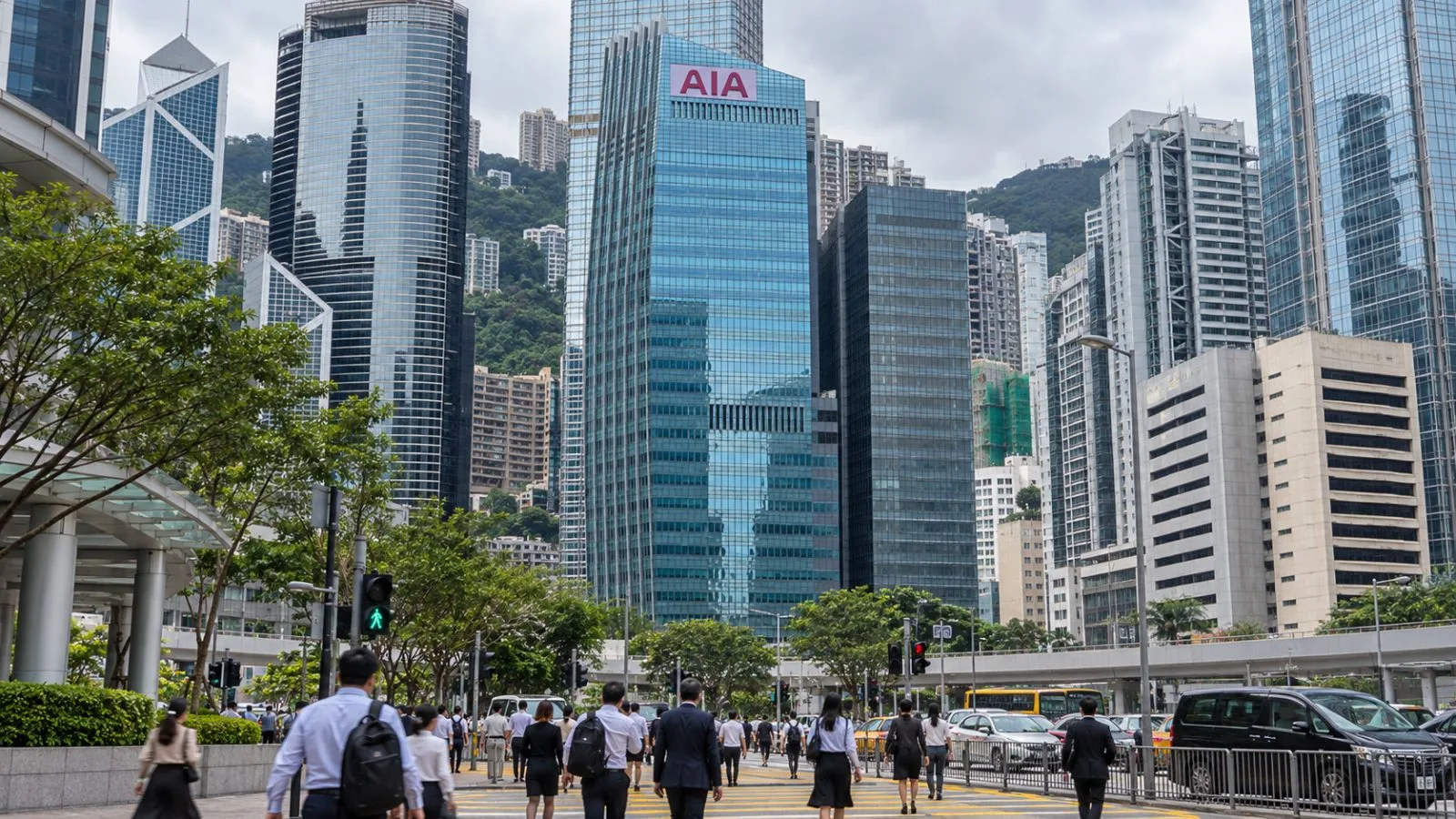 Office workers pass AIA Central in Hong Kong's Central district on an overcast morning / EconoTimes.ai