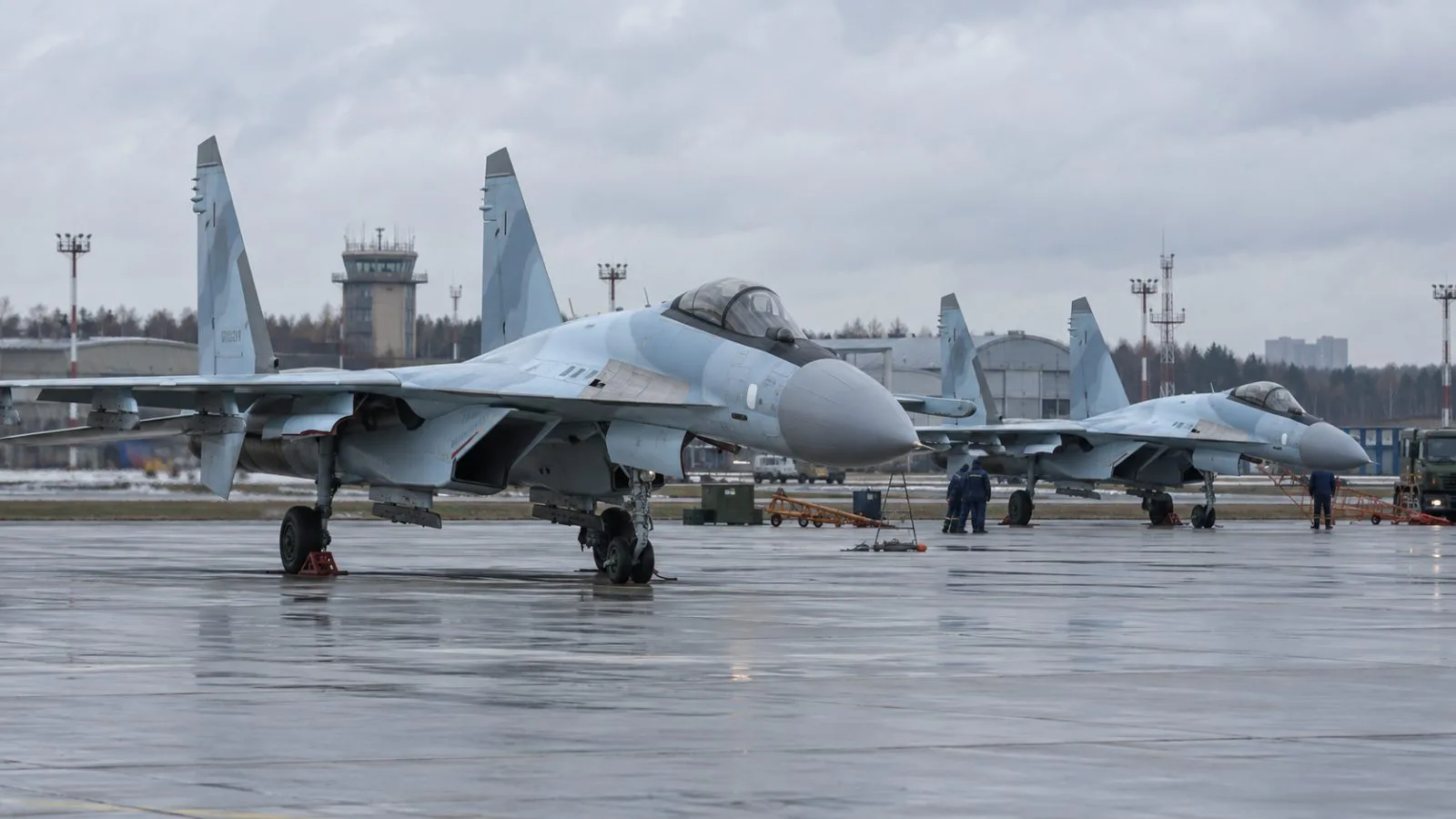 Two fighter jets stand on the apron at Zhukovsky Airport near Moscow. (AI-generated image / EconoTimes)