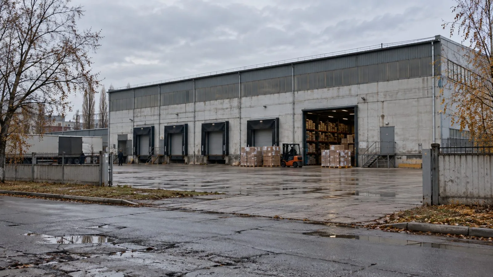 A book warehouse loading area sits quiet on an overcast day in Kharkiv, Ukraine. (AI-generated image / EconoTimes)