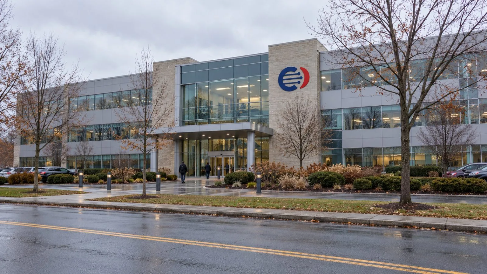 A pedestrian approaches Amphenol's headquarters in Wallingford, Connecticut, on Wednesday morning. / EconoTimes.ai