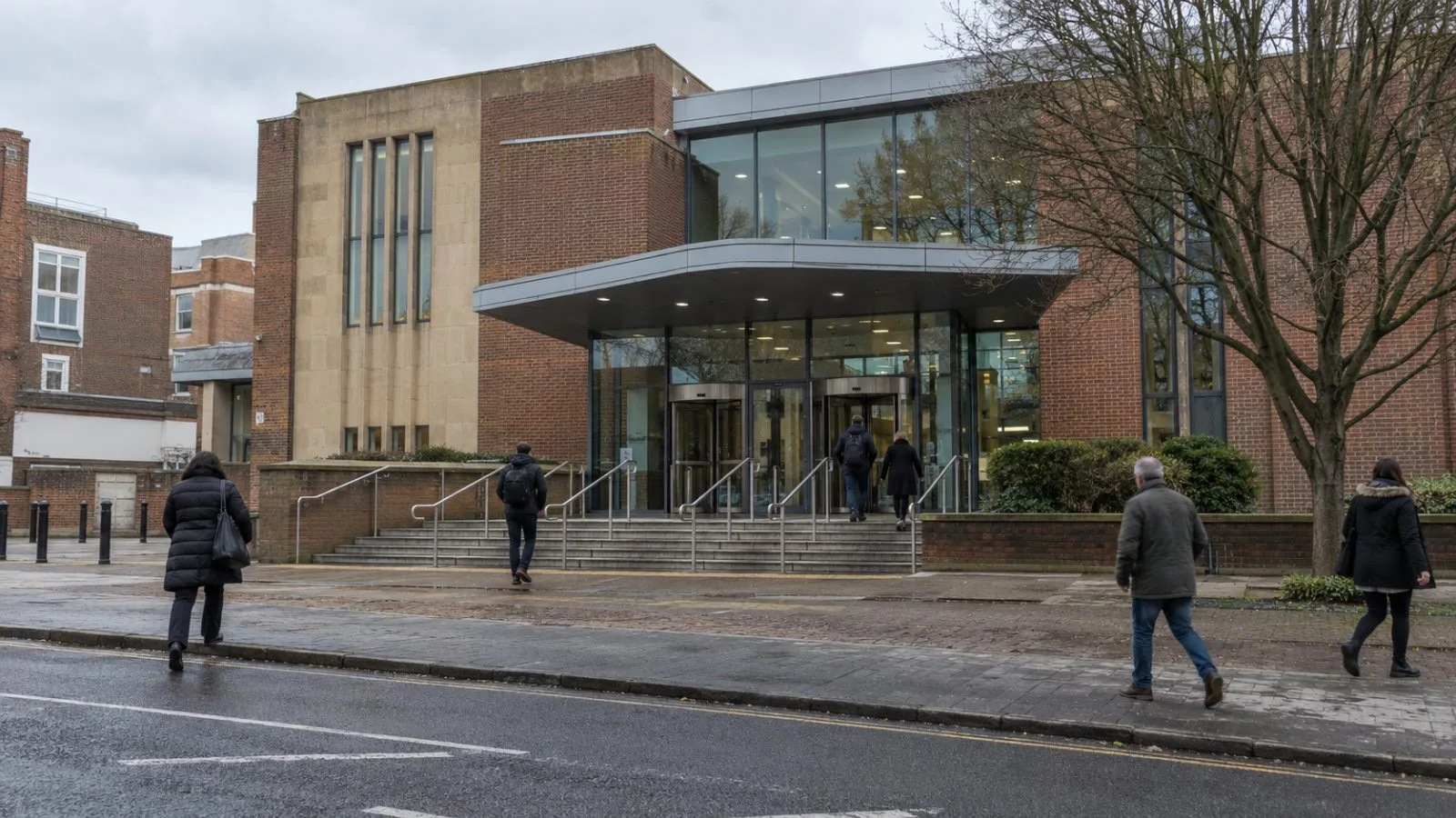 Pedestrians pass Ipswich Magistrates' Court in Ipswich, England, beneath an overcast sky. (AI-generated image / EconoTimes)