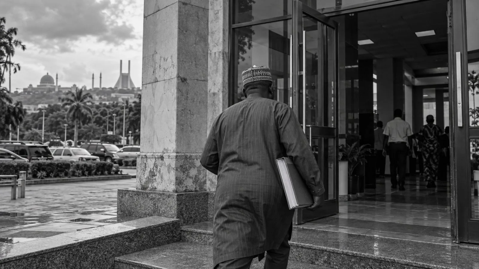 An anonymous civil servant carries a bound register outside a federal office in Abuja, Nigeria. (AI-generated image / EconoTimes)