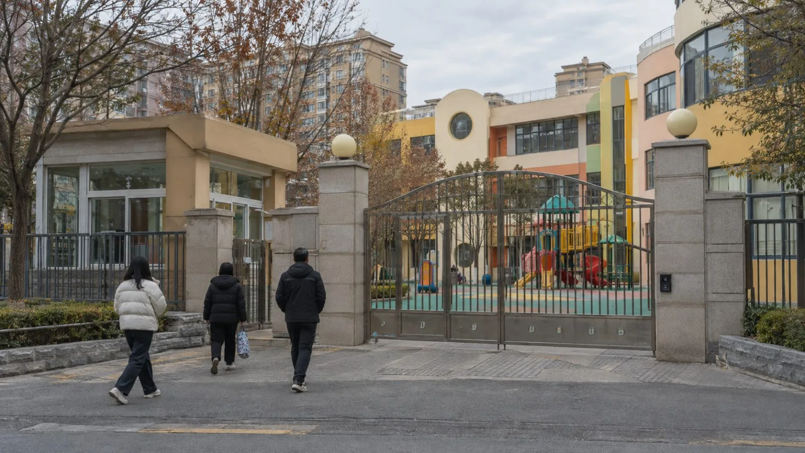 Adults walk past a kindergarten entrance in Tianshui, Gansu province, China. (AI-generated image / EconoTimes)