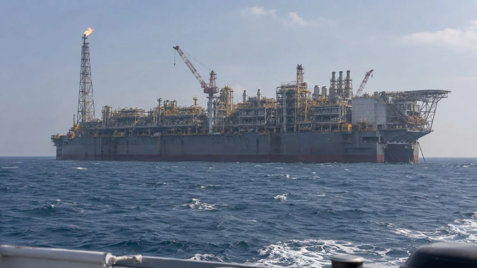 The Scarborough floating production unit sits offshore from Karratha, Western Australia. (AI-generated image / EconoTimes)