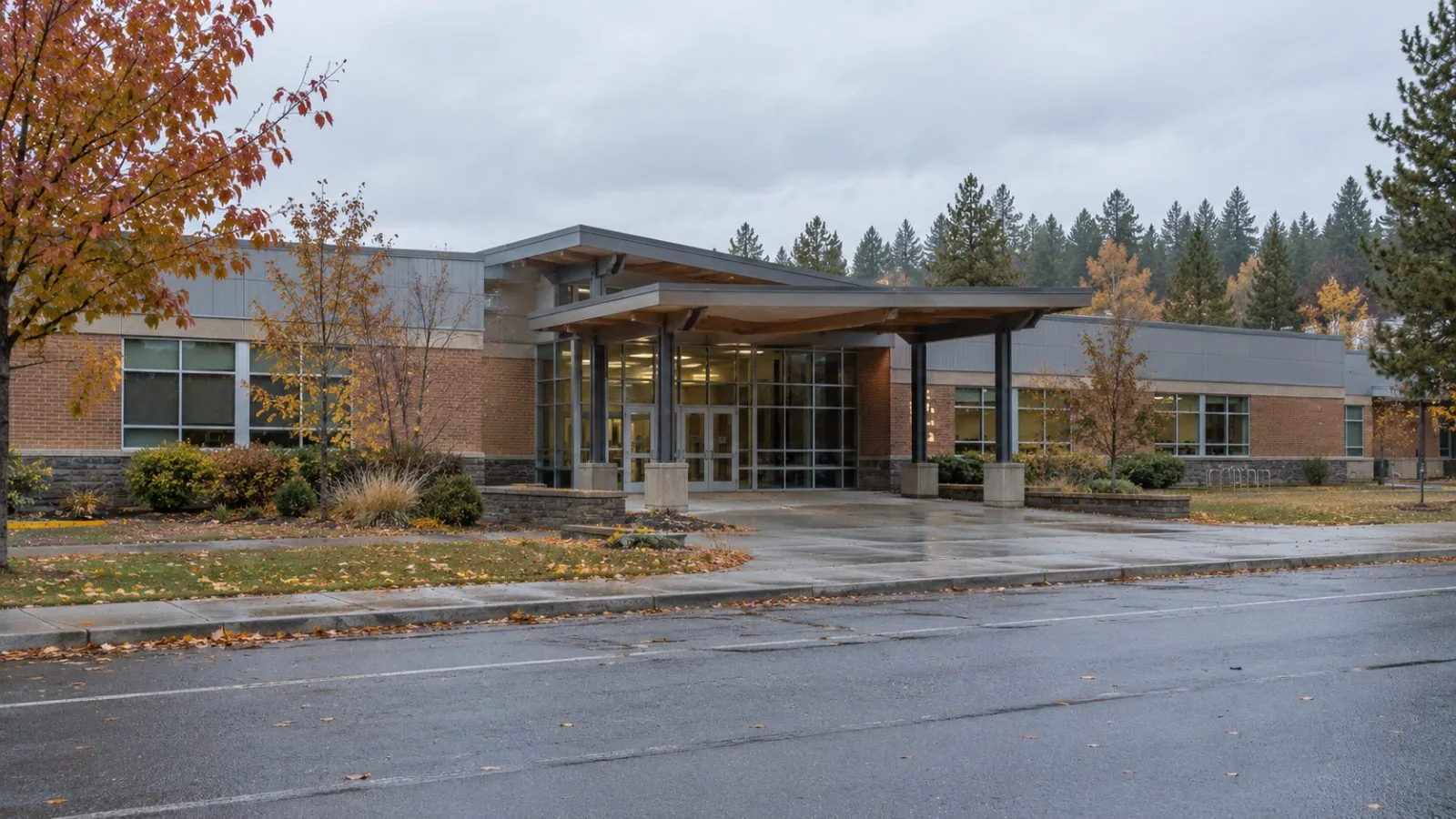 The entrance to Silver Rail Elementary stands quiet in Bend, Oregon, after a fatal school shooting. (AI-generated image / EconoTimes)
