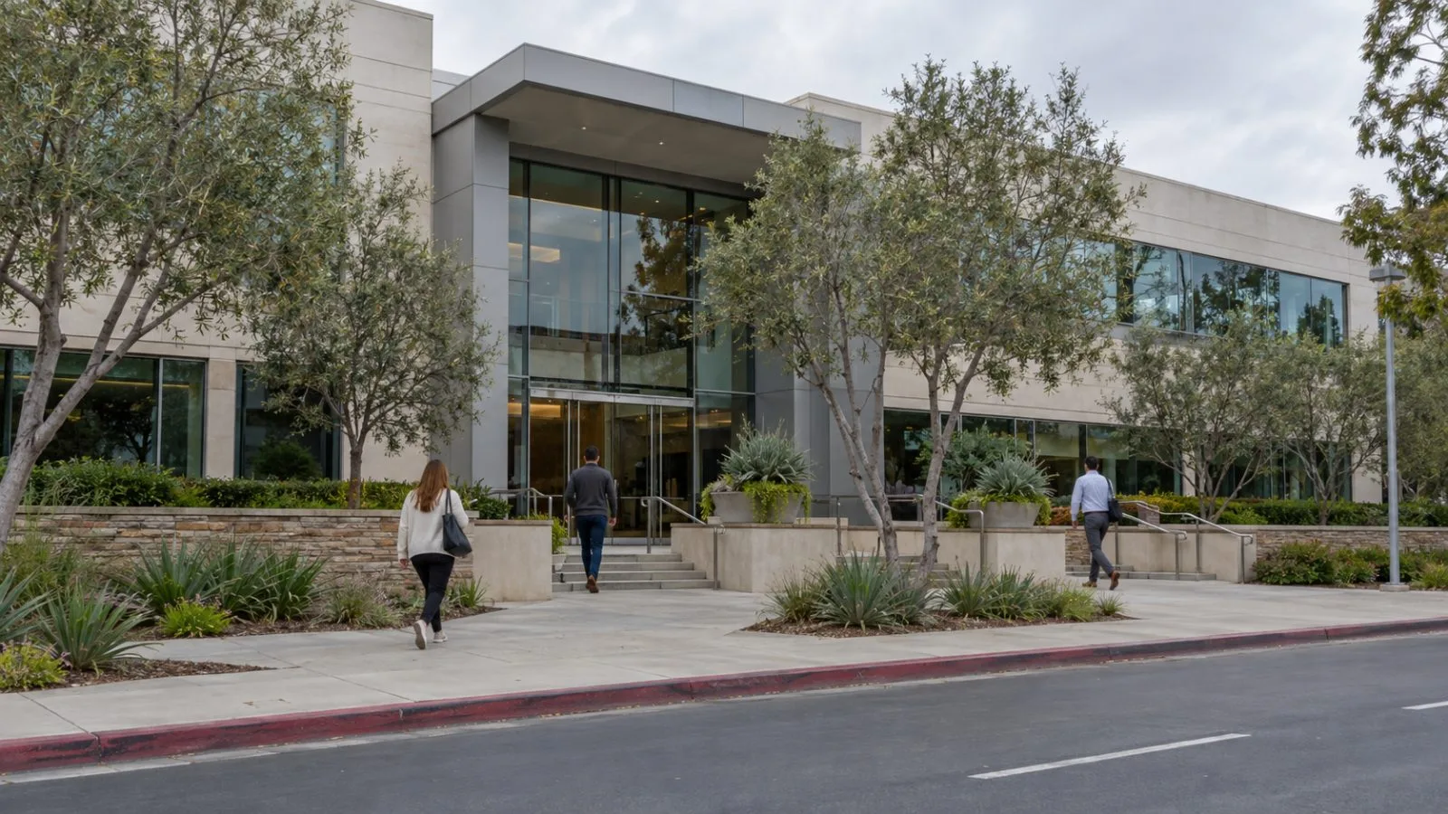 People walk past an office building on Eastgate Mall in San Diego, California. (AI-generated image / EconoTimes)