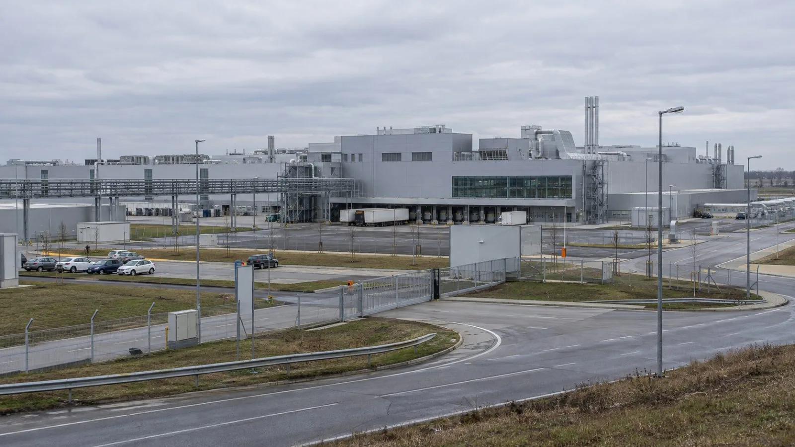 A passenger-car factory stands beside an access road in Szeged, Hungary. (AI-generated image / EconoTimes)