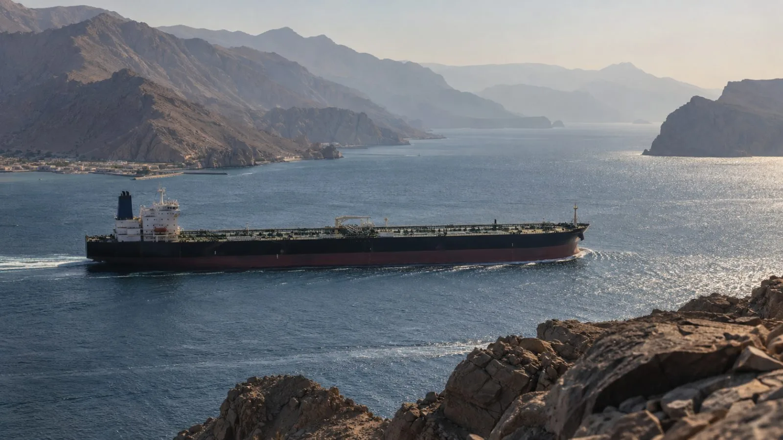 An oil tanker passes through the Strait of Hormuz off Khasab, Oman. (AI-generated image / EconoTimes)