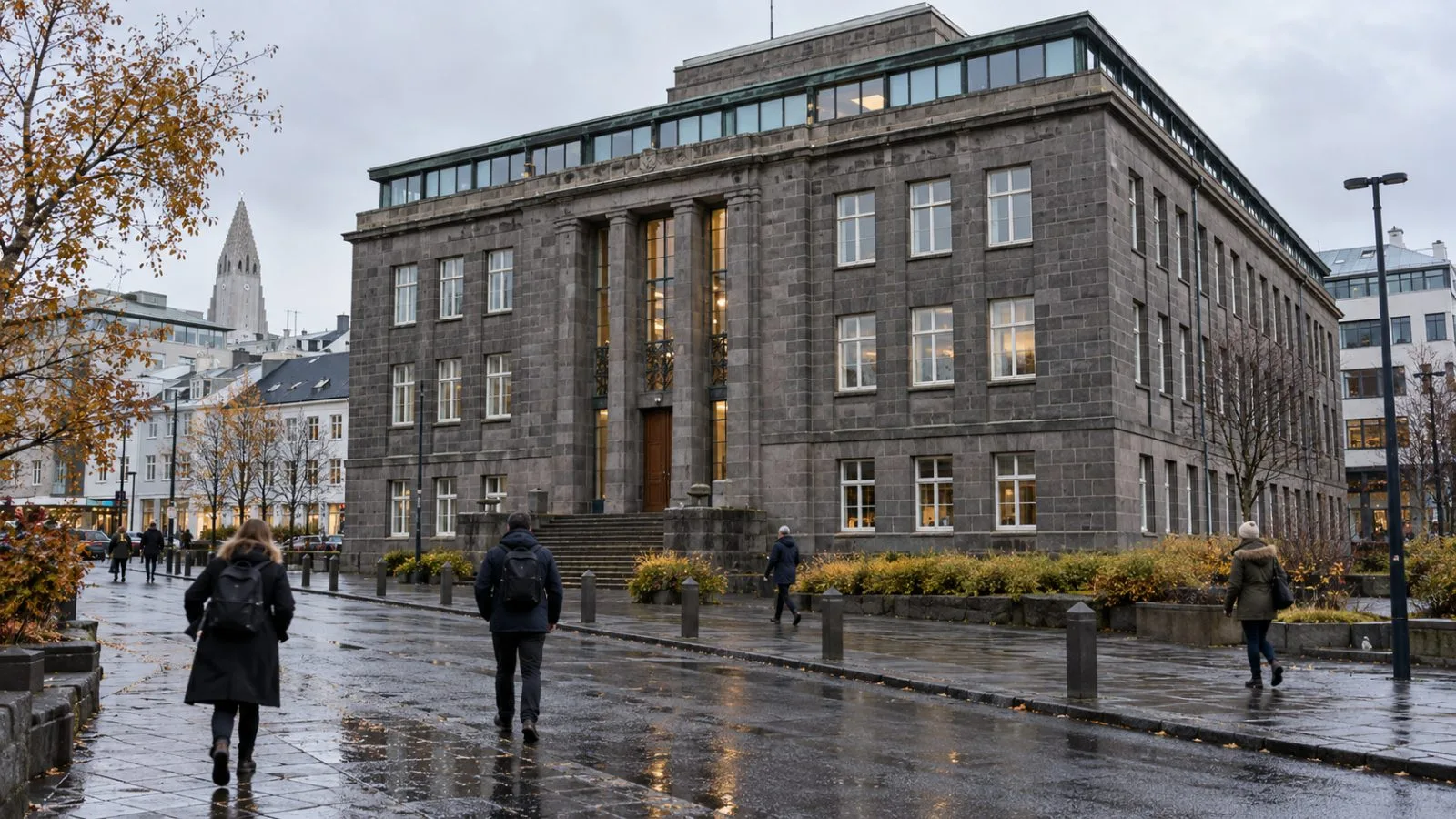 Pedestrians pass Iceland's government offices in central Reykjavík on an overcast morning. (AI-generated image / EconoTimes)