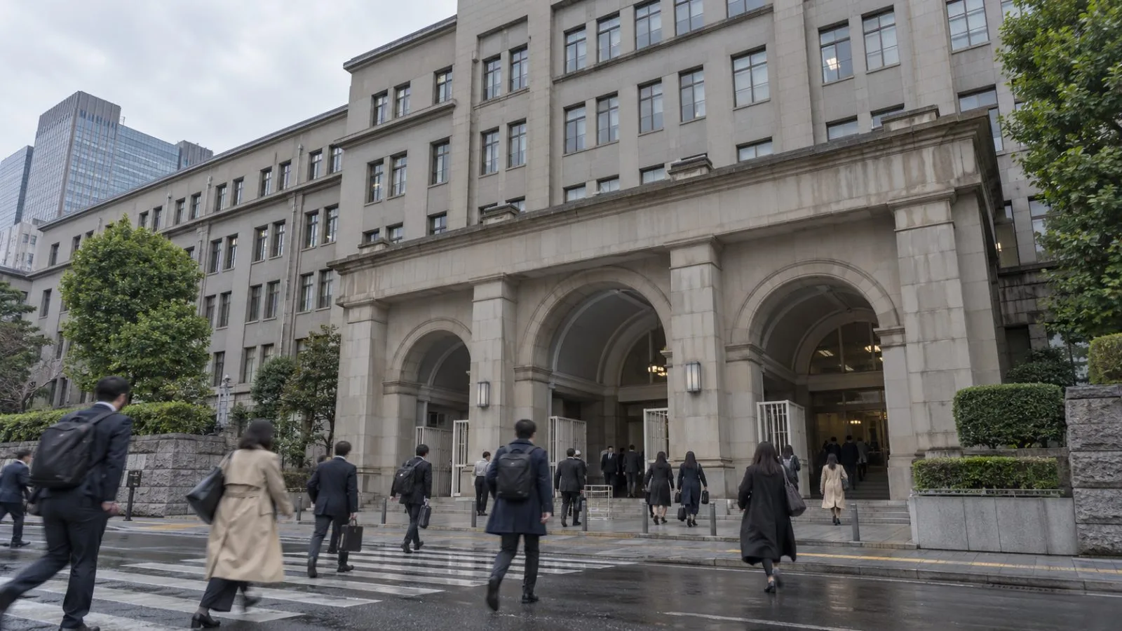 Commuters pass the Ministry of Finance in Tokyo beneath an overcast morning sky (AI-generated image / EconoTimes)