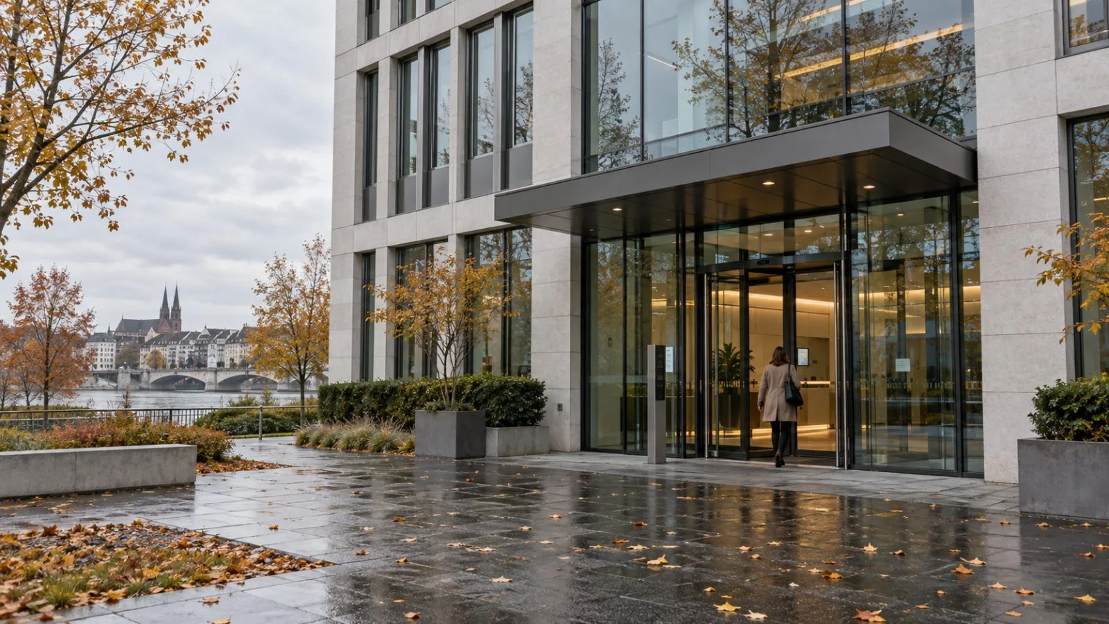 An employee enters a modern office building in Basel, Switzerland. (AI-generated image / EconoTimes)
