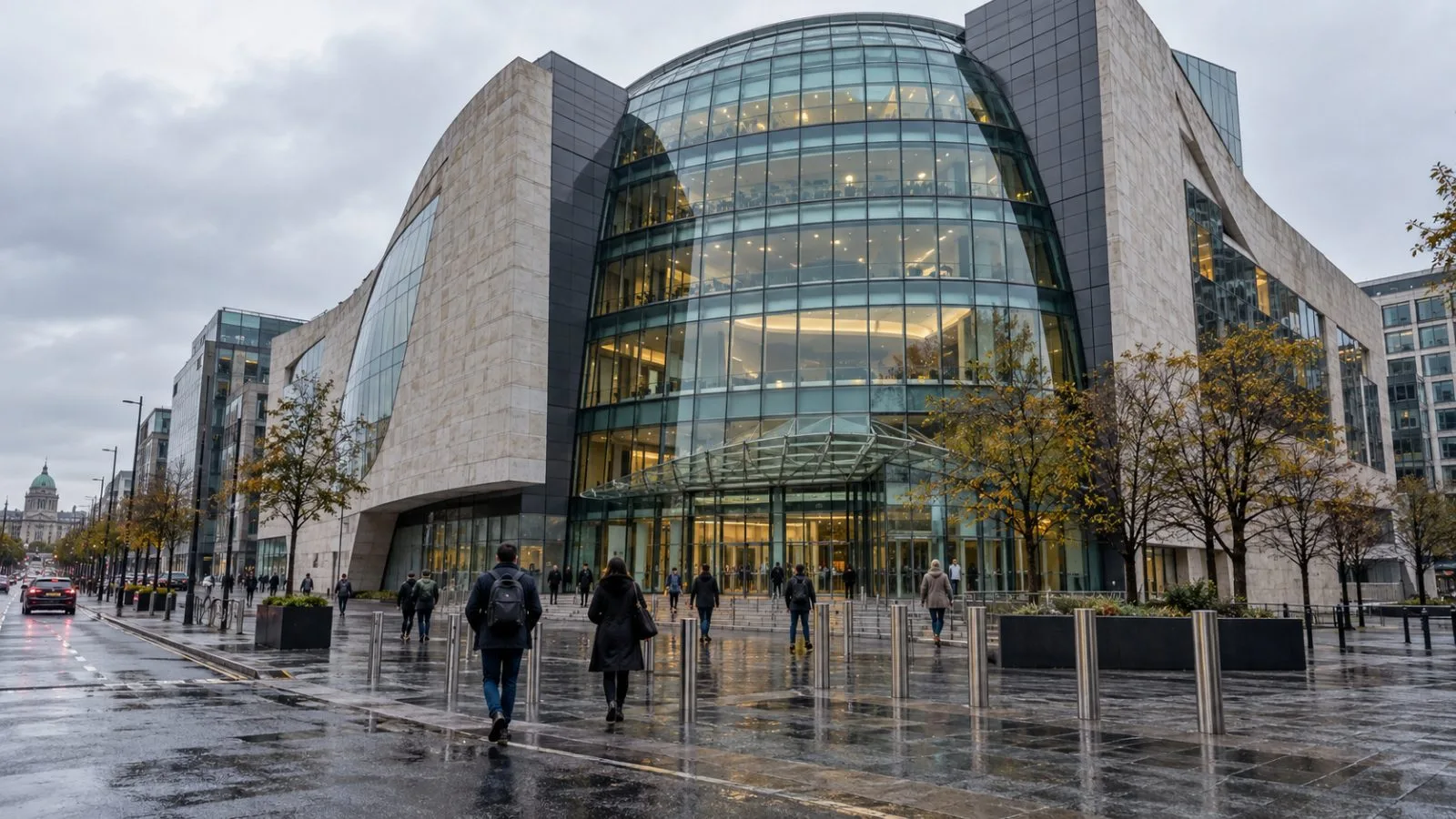 Pedestrians pass the Central Bank of Ireland building in Dublin on an overcast morning. / EconoTimes.ai