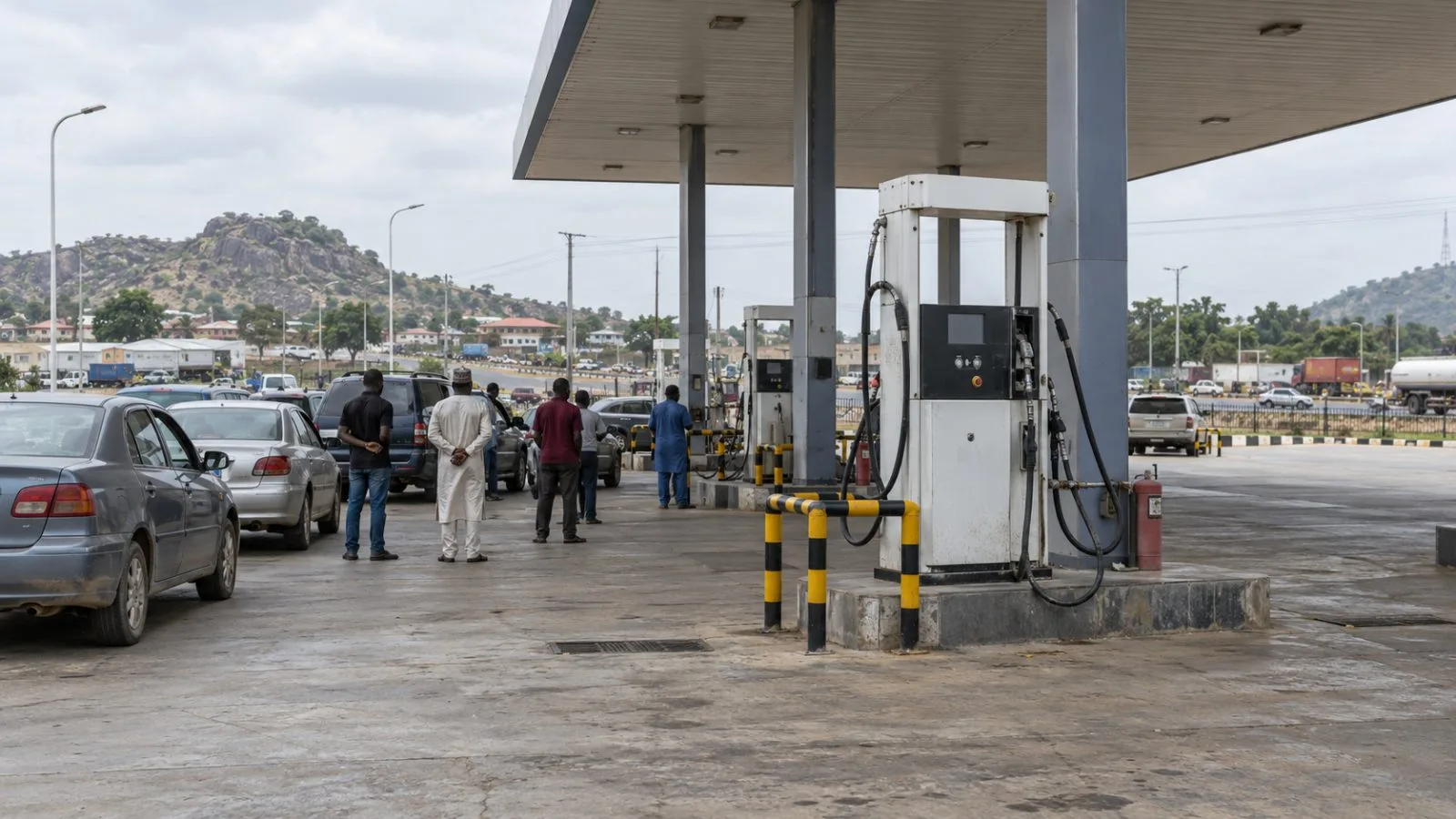 Motorists gather beside an idle CNG dispenser at a station in Minna, Nigeria. (AI-generated image / EconoTimes)
