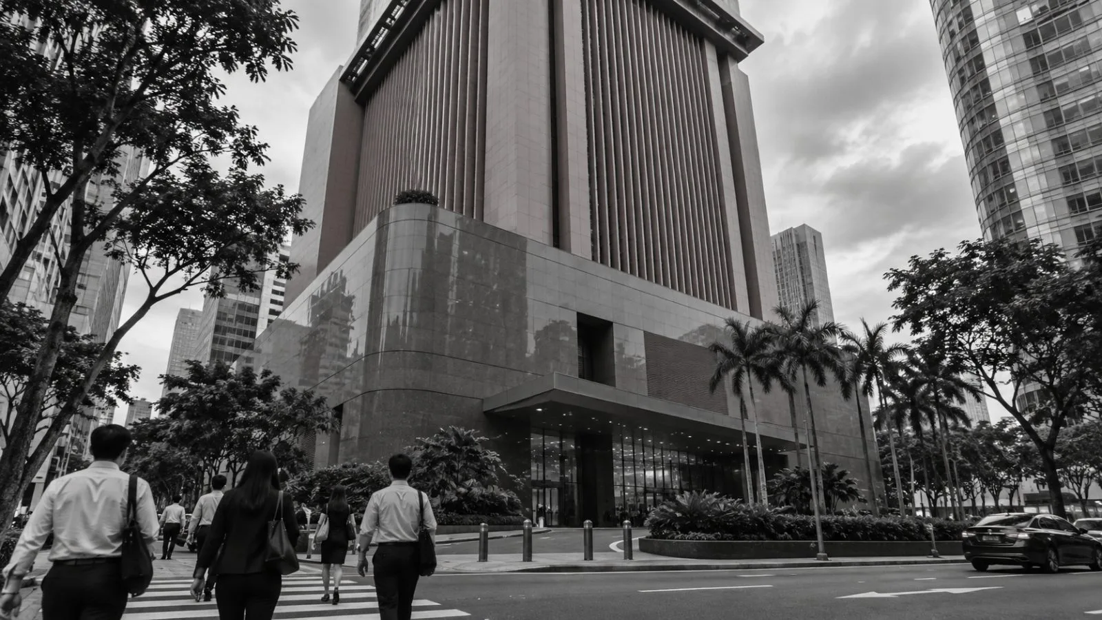 Commuters pass the Monetary Authority of Singapore building on Shenton Way. / EconoTimes.ai