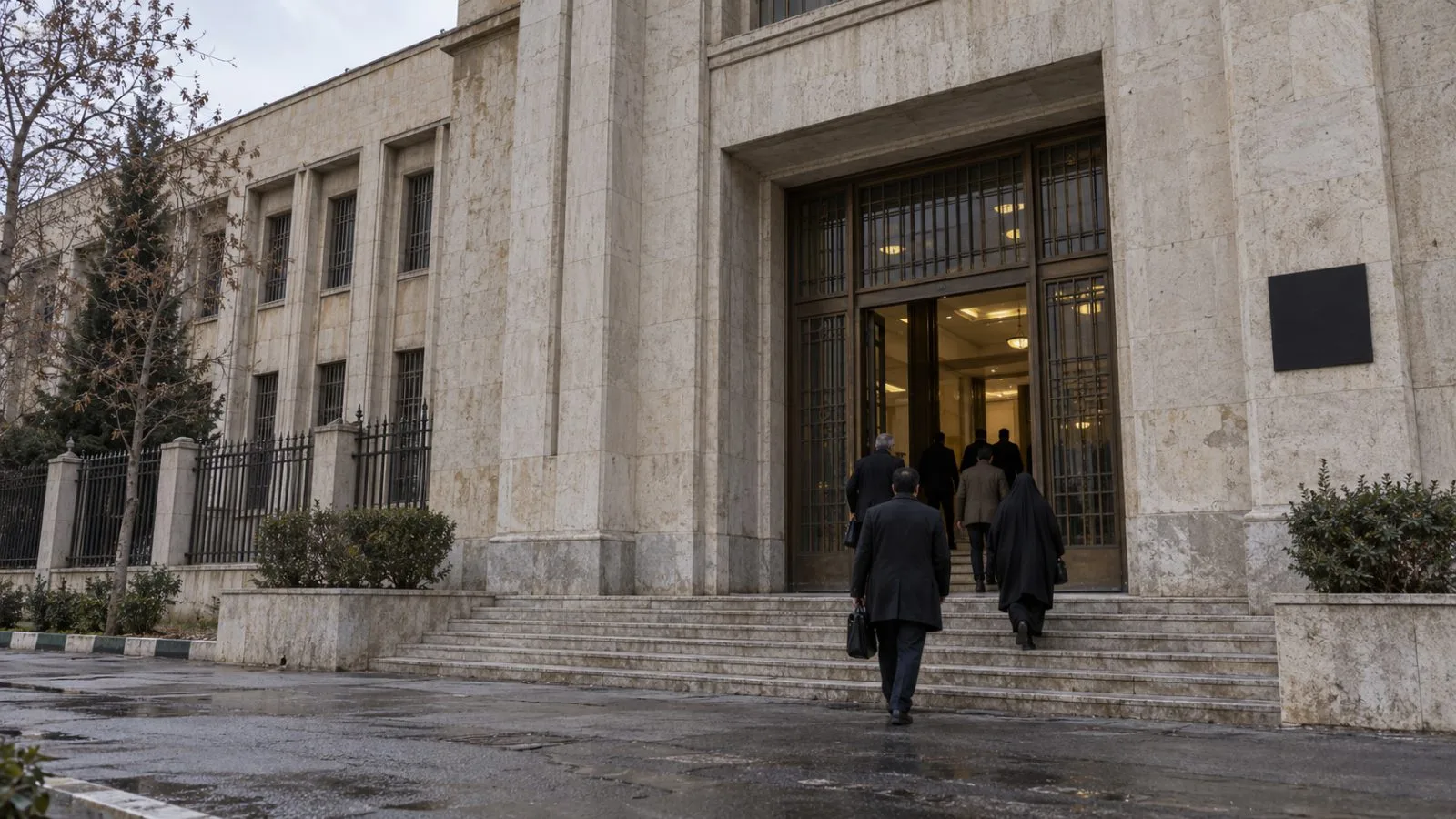 People walk past the Tehran Revolutionary Court building in central Tehran. / EconoTimes.ai