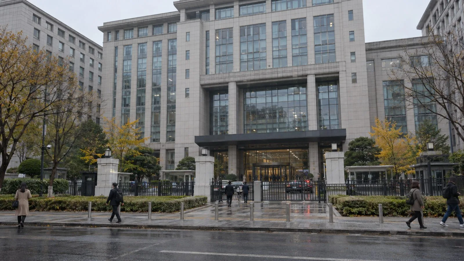 Pedestrians pass the Ministry of Commerce building in Beijing, China. / EconoTimes.ai