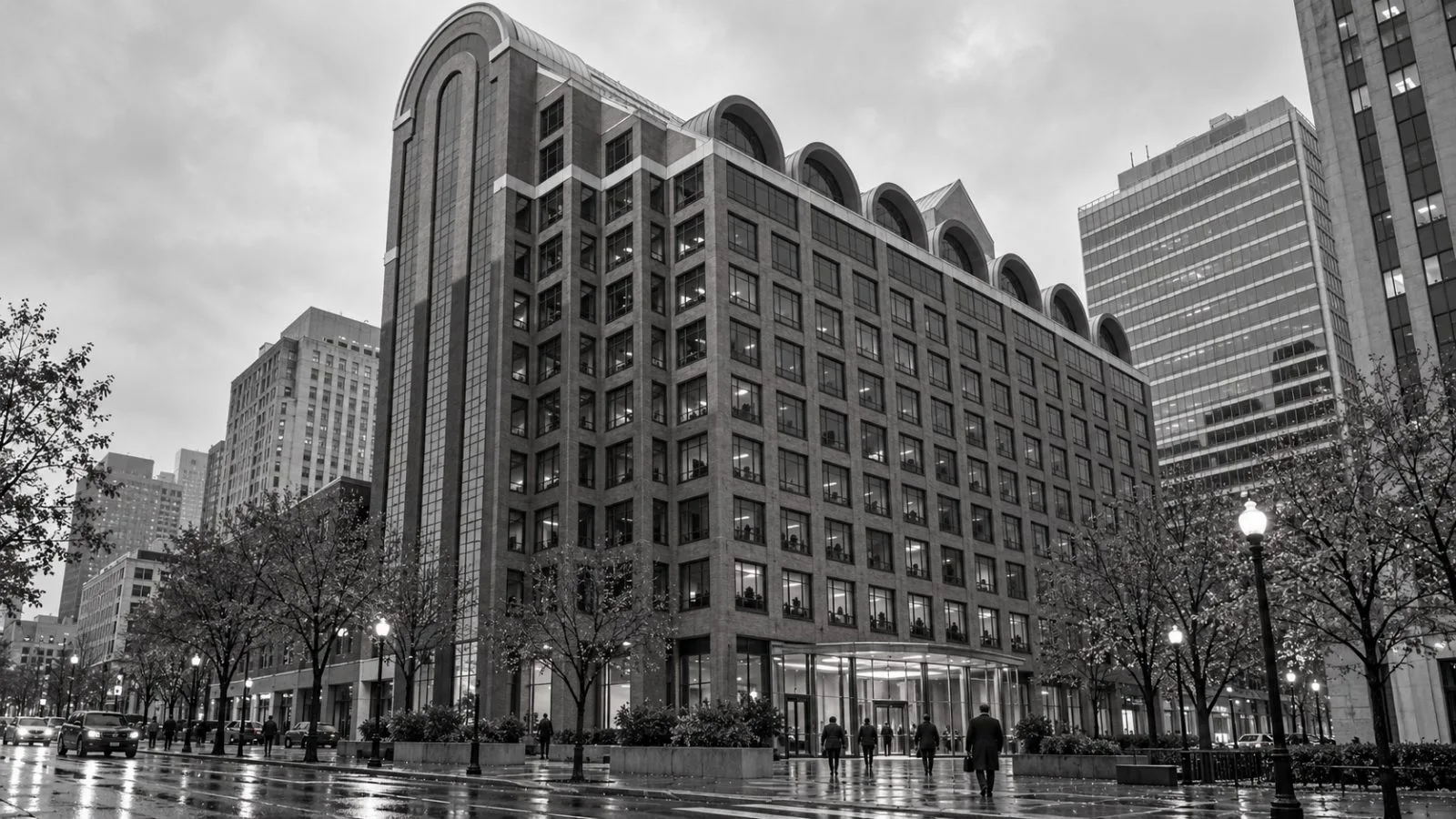 Office workers enter a downtown financial firm's headquarters in St. Louis, Missouri. / EconoTimes.ai