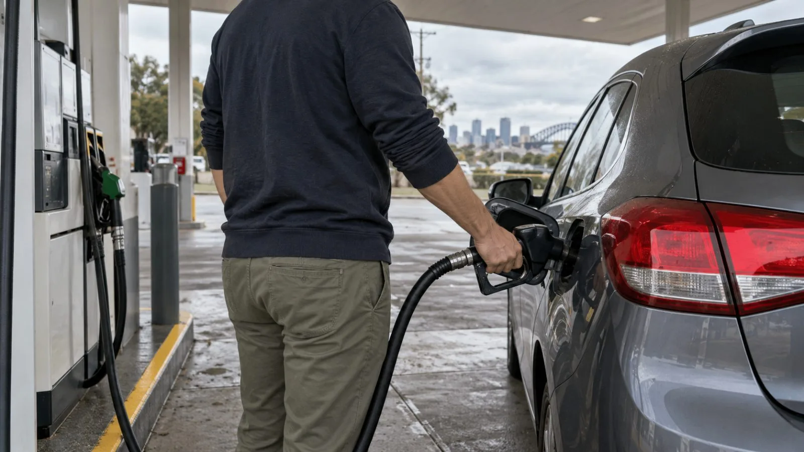 A motorist refuels at a service station in Sydney, Australia. (AI-generated image / EconoTimes)