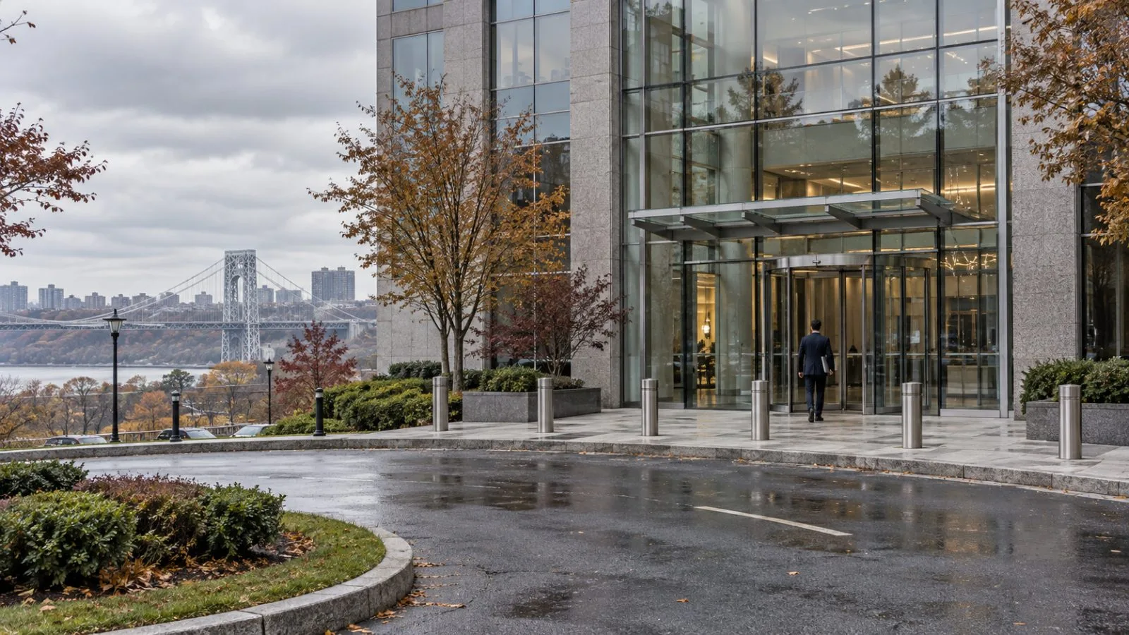 An employee enters a glass-fronted bank headquarters in Fort Lee, New Jersey, on an overcast morning. (AI-generated image / EconoTimes)