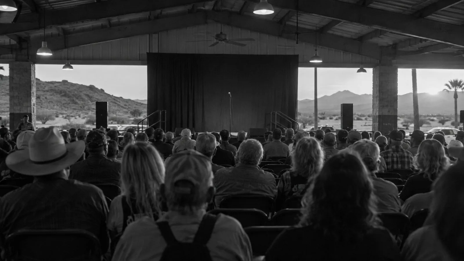 Supporters face a campaign stage at a rally venue in Bullhead City, Arizona. (AI-generated image / EconoTimes)