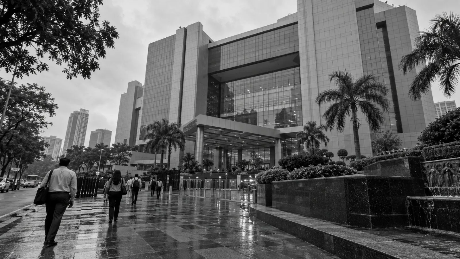 Commuters approach the National Stock Exchange building in Mumbai on an overcast morning. (AI-generated image / EconoTimes)
