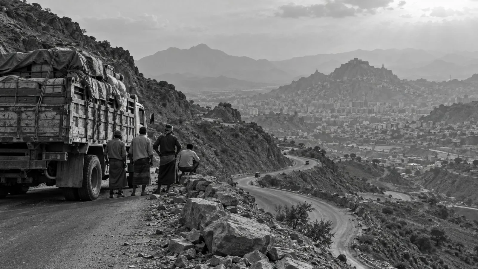 A cargo truck stands on a mountain road outside Taiz, Yemen. (AI-generated image / EconoTimes)