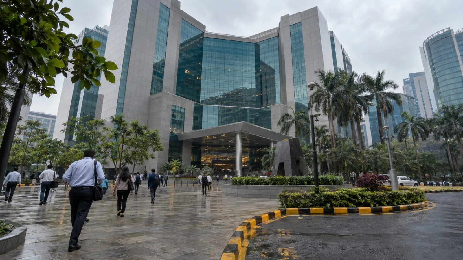 Pedestrians pass the glass exterior of the National Stock Exchange headquarters in Mumbai, India. (AI-generated image / EconoTimes)