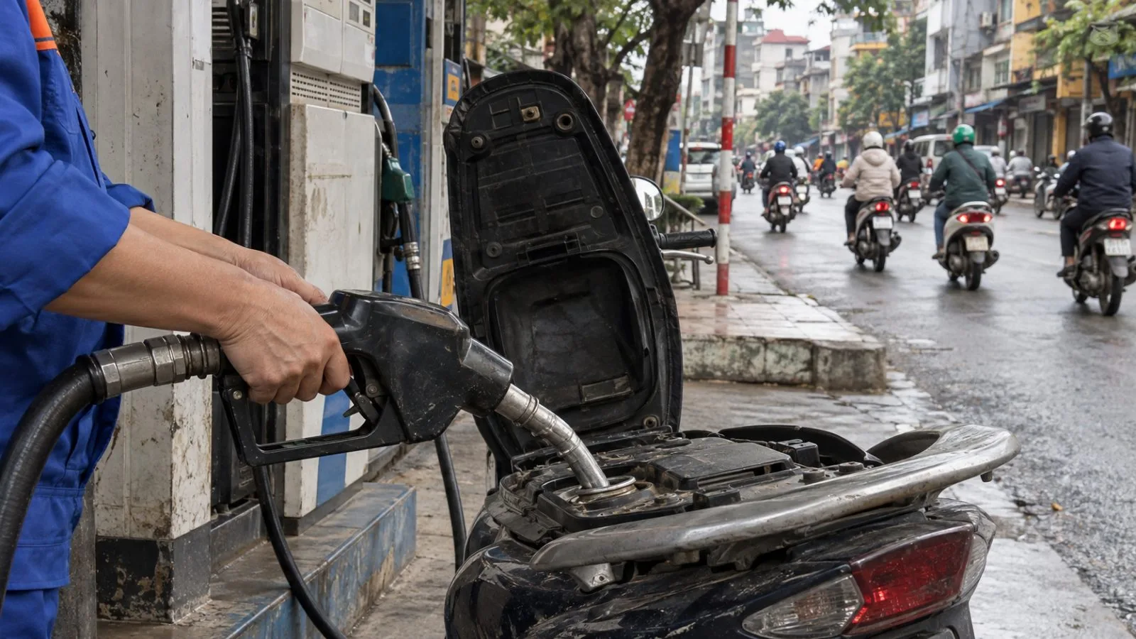 A motorbike is refueled at a neighborhood petrol station in Hanoi, Vietnam. / EconoTimes.ai
