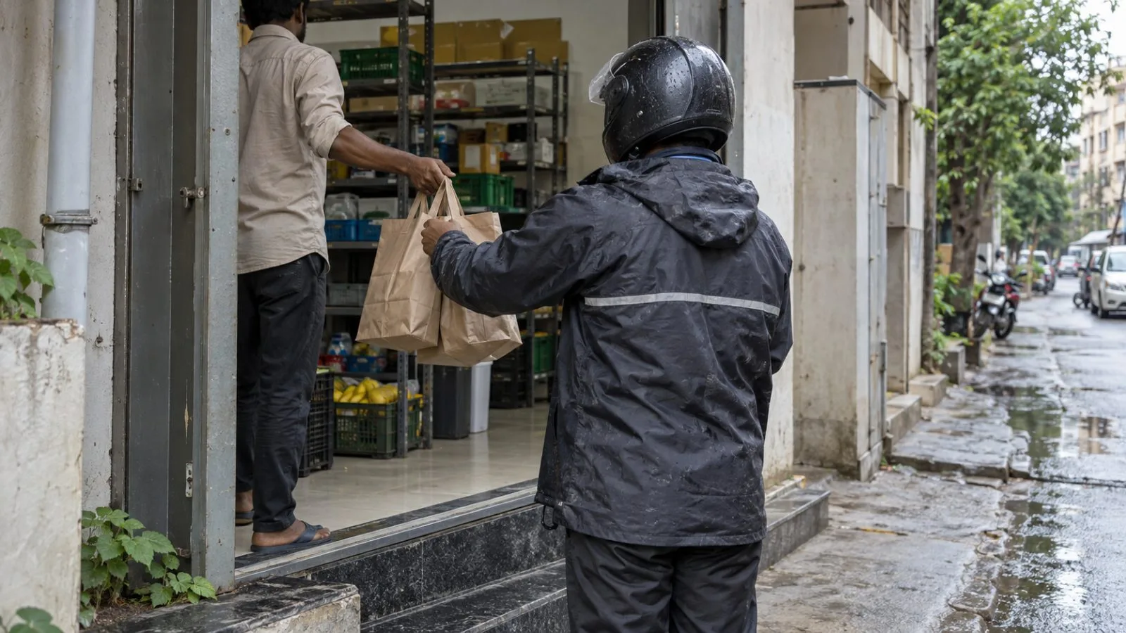 A delivery rider collects grocery bags outside a dark store in Bengaluru, India. (AI-generated image / EconoTimes)