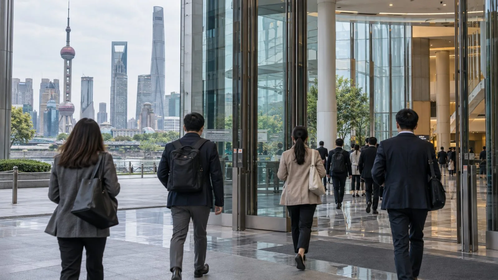 Pedestrians cross the forecourt outside Indonesia’s Ministry of Finance in Jakarta. / EconoTimes.ai