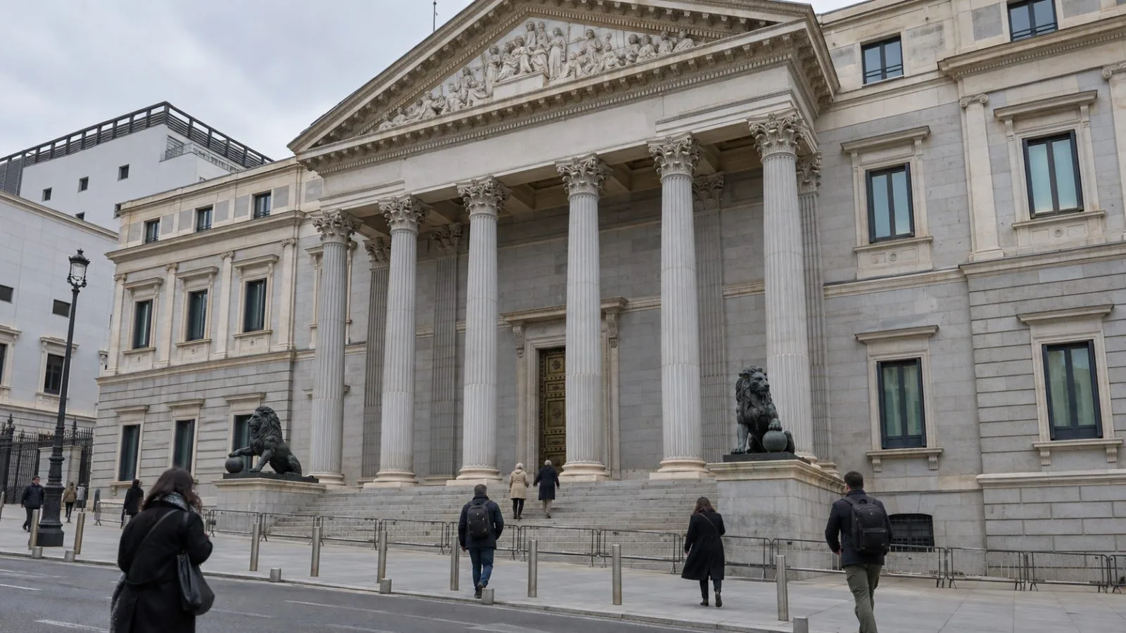 Pedestrians pass the Congress of Deputies in Madrid on an overcast morning. (AI-generated image / EconoTimes)