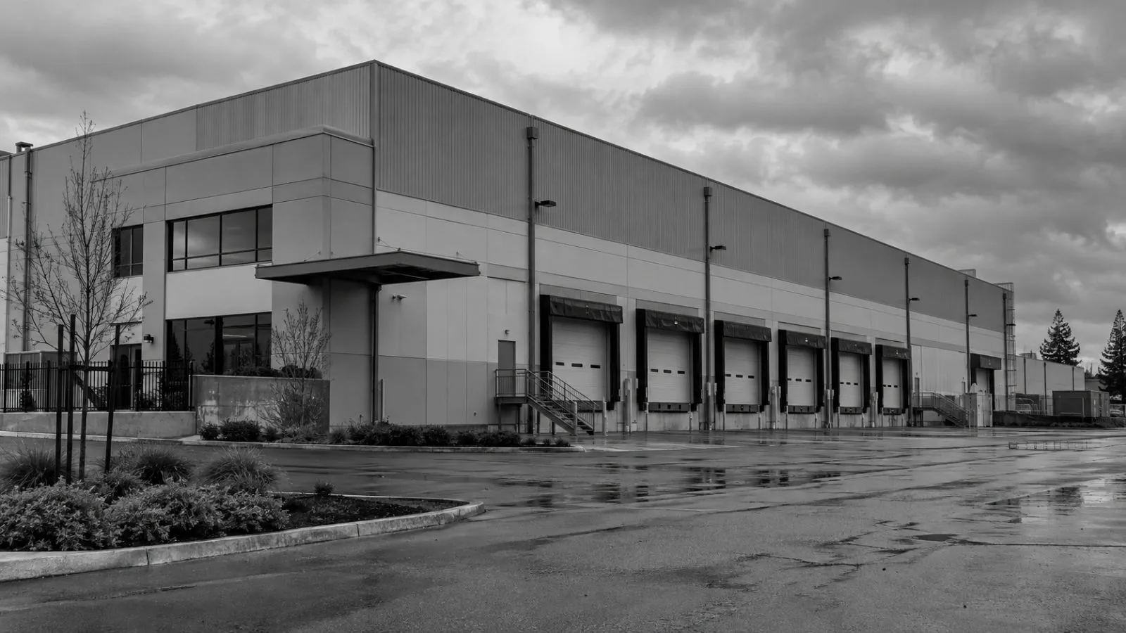 Loading bays stand at a planned battery storage facility in Sacramento, California. (AI-generated image / EconoTimes)