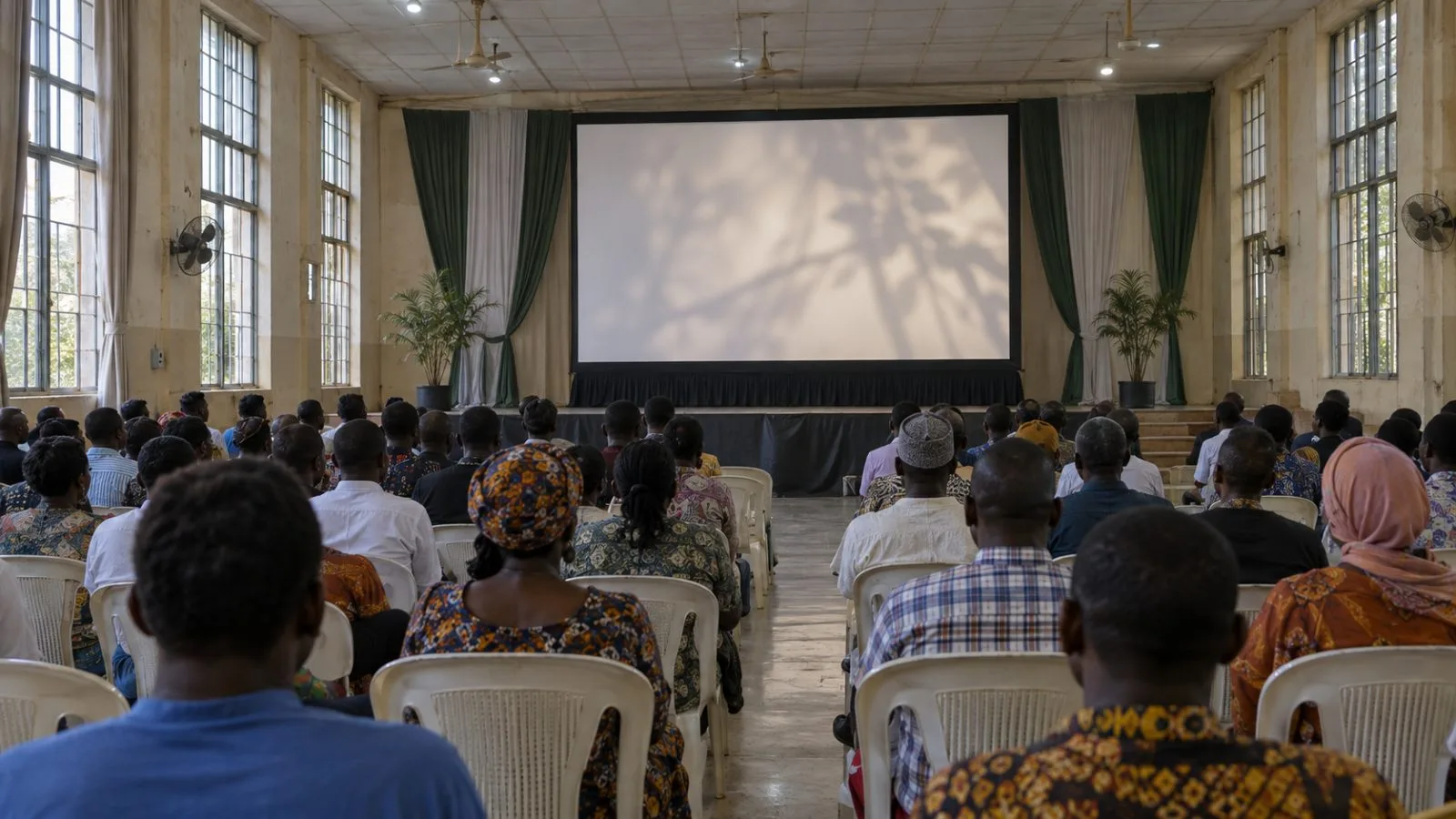 Attendees watch a campaign video at a political movement launch in Lagos, Nigeria (AI-generated image / EconoTimes)