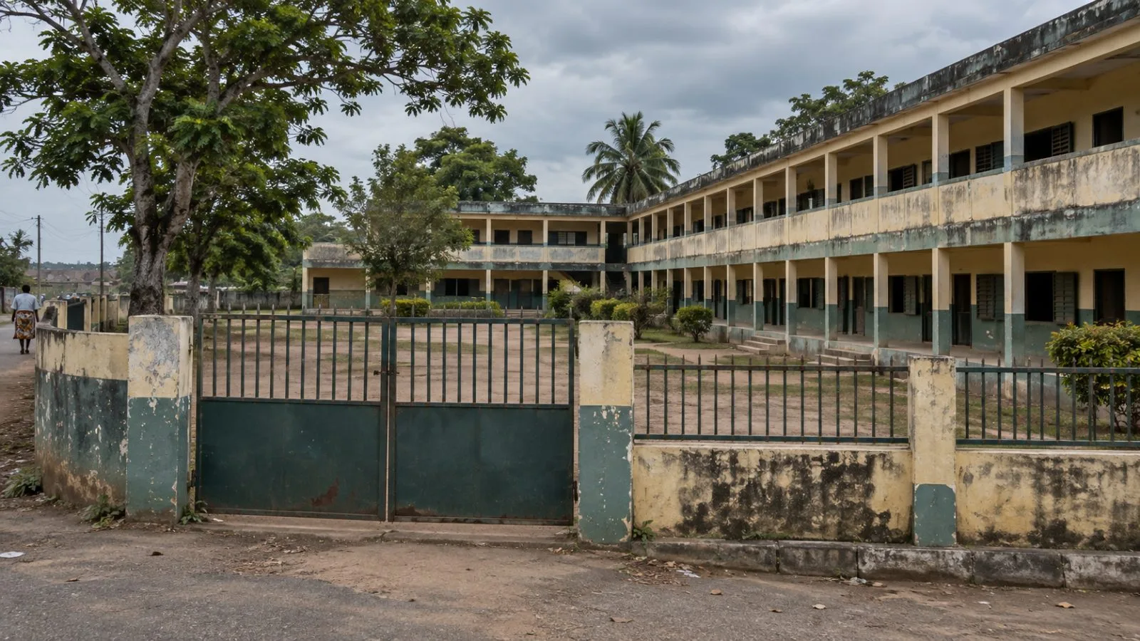 A school entrance stands quiet after classes were suspended in Ago-Iwoye, Nigeria (AI-generated image / EconoTimes)