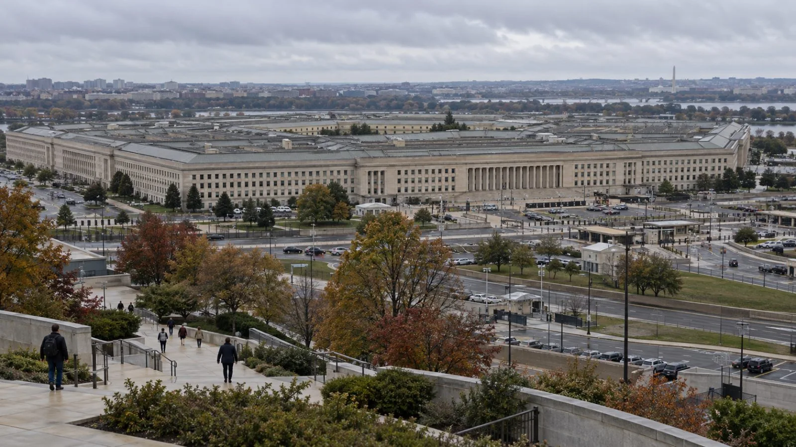 Pedestrians walk past the Pentagon in Arlington, Virginia, under cloudy morning light. (AI-generated image / EconoTimes)