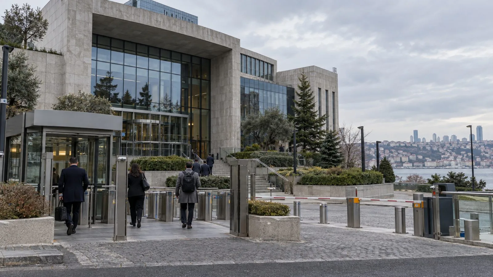 Pedestrians cross outside the Borsa Istanbul complex in Sarıyer, Istanbul, Türkiye. / EconoTimes.ai