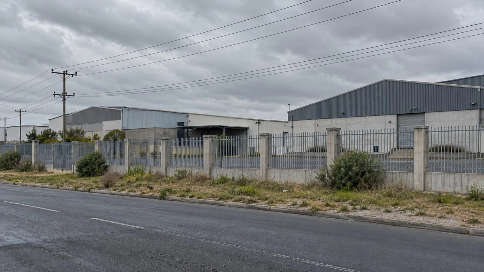Industrial properties line a road in King Air Industria, Cape Town. (AI-generated image / EconoTimes)
