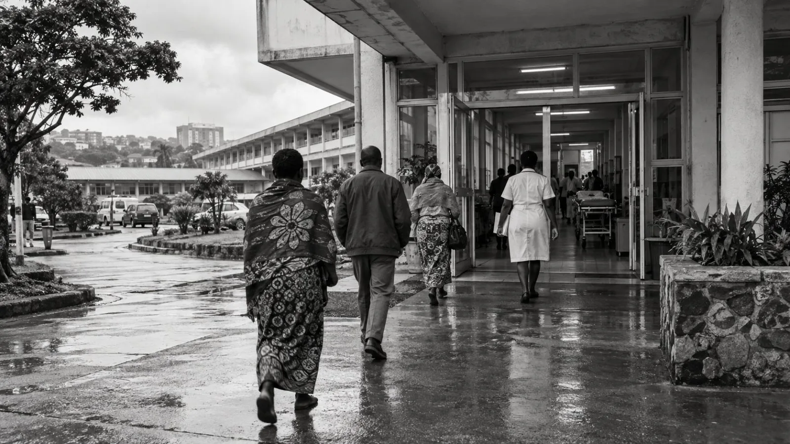 Patients enter Kamuzu Central Hospital in Lilongwe, Malawi, on an overcast morning. (AI-generated image / EconoTimes)