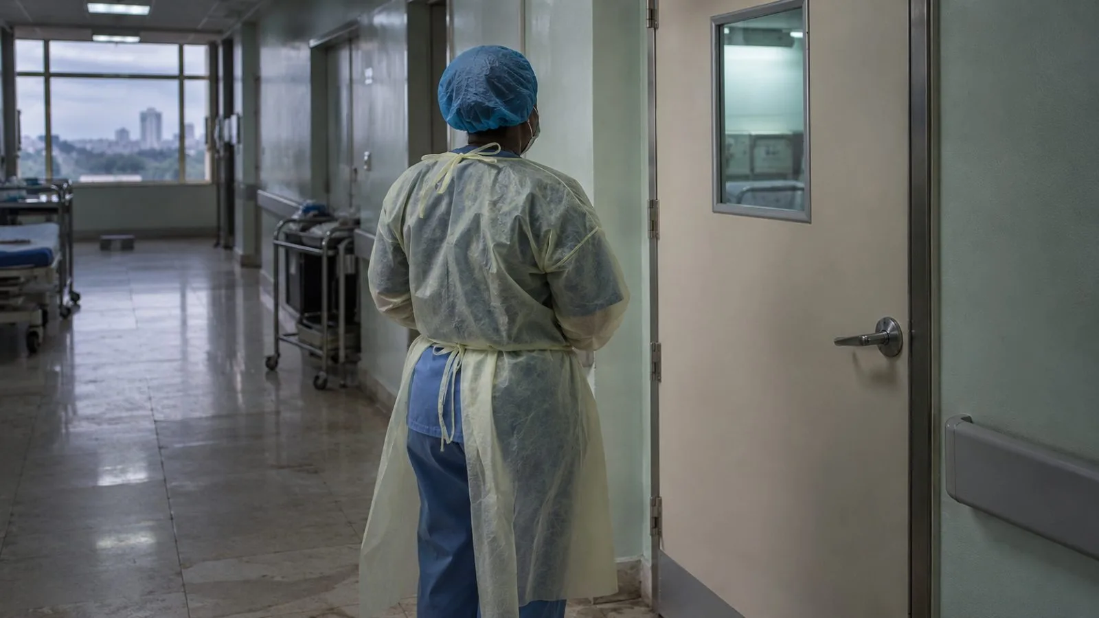 A hospital isolation ward corridor in Abuja, Nigeria, during a cloudy afternoon. (AI-generated image / EconoTimes)