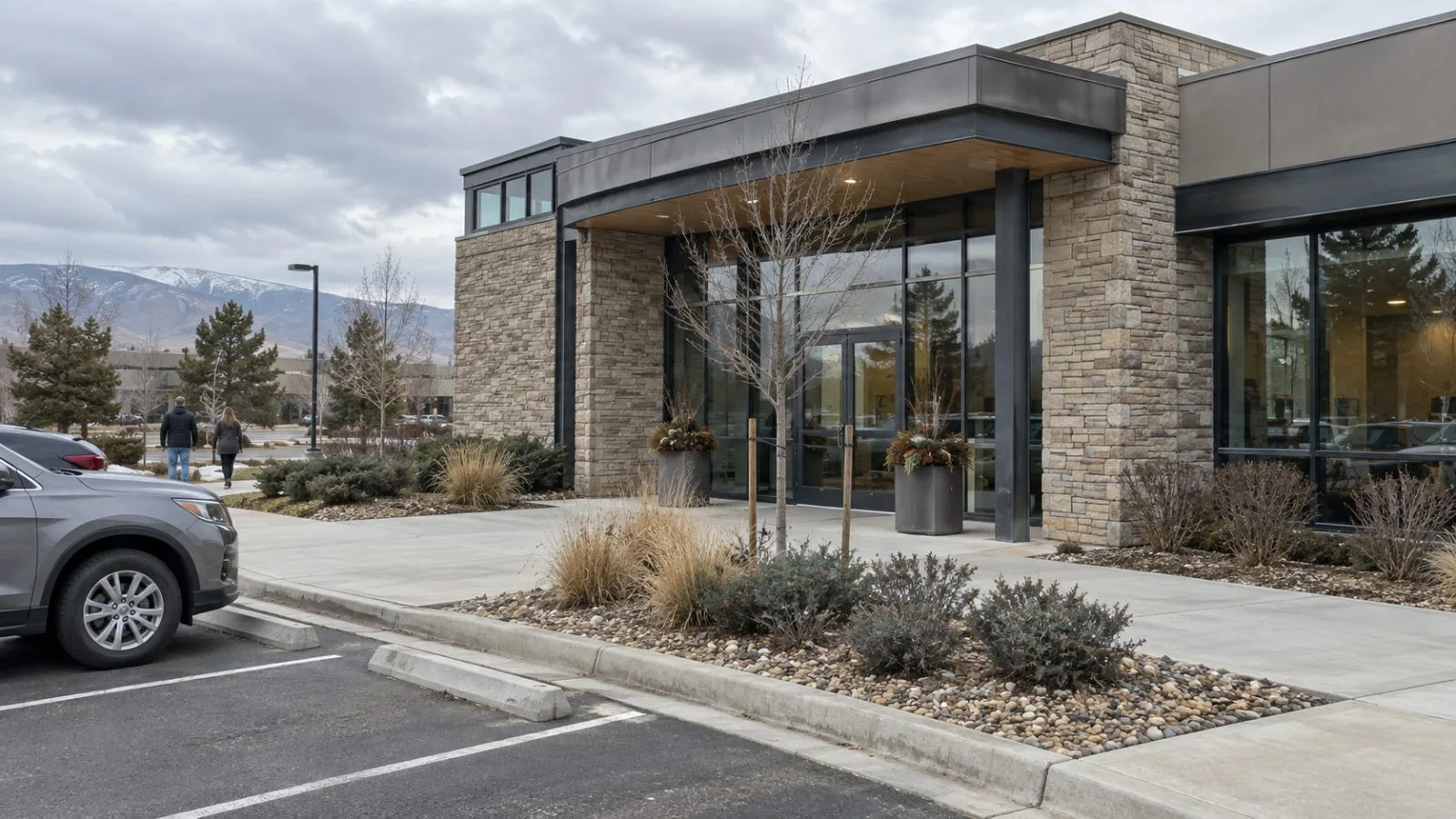 A specialty-care clinic entrance sits along McWhinney Boulevard in Loveland, Colorado. (AI-generated image / EconoTimes)