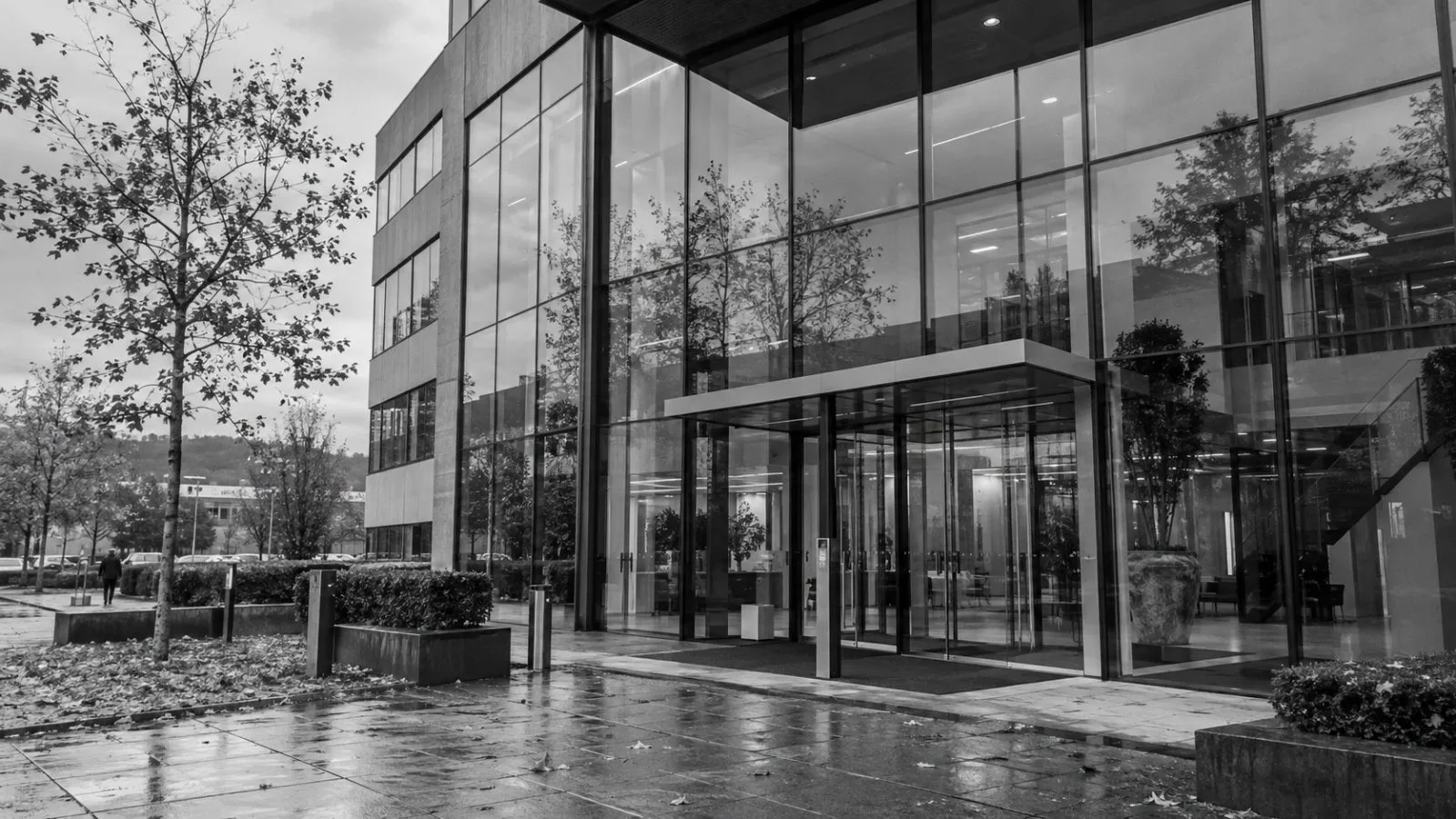 The CAP Business Center office building in Herstal, Belgium, on an overcast morning. (AI-generated image / EconoTimes)