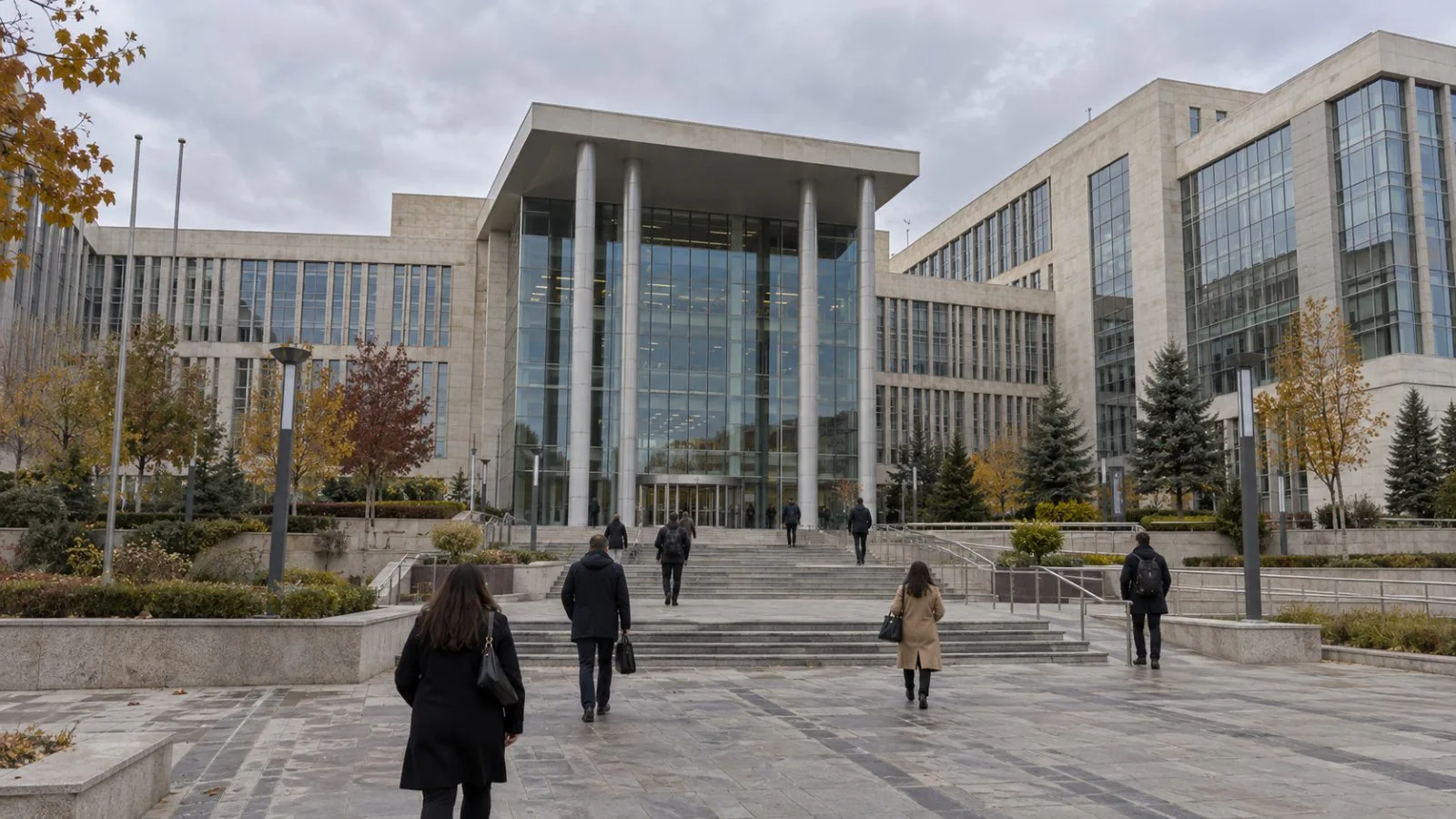 Pedestrians pass the Turkish Statistical Institute headquarters in Ankara, Türkiye. (AI-generated image / EconoTimes)